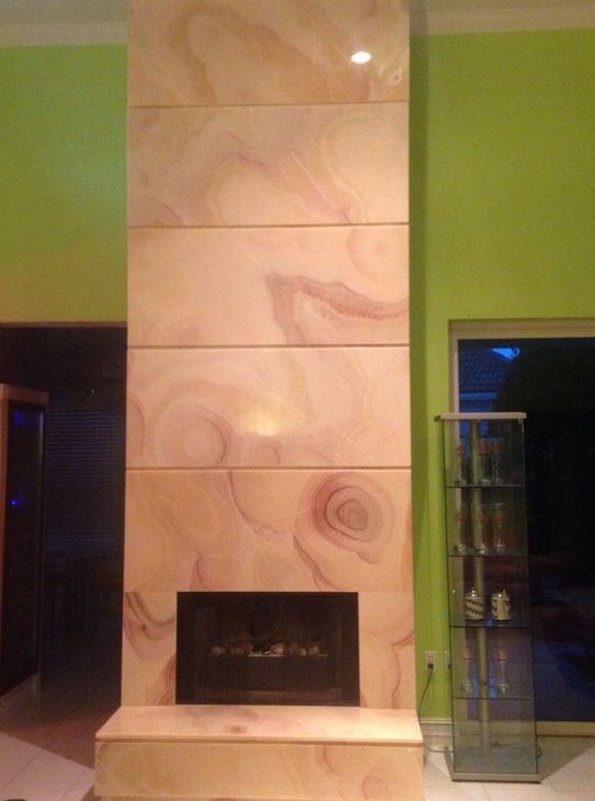 Bluewater Bay - Fireplace in Honey Onyx
